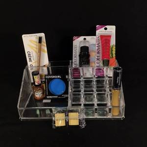 lot 8 image: Assortment of Colormates, Revlon, and Covergirl Makeup Products