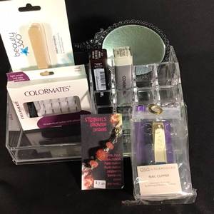 lot 13 image: Glam Beauty Set with Nail Clipper, Eyelash Kit, and More