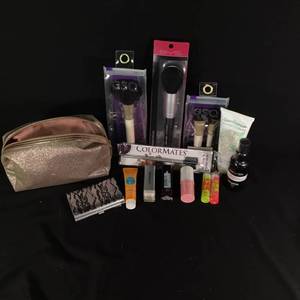 Collection of Makeup and Beauty Items with Sparkling Cosmetic Bag