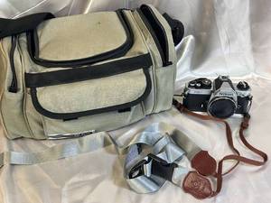 Nikon FM2 Film Camera with Accessories and Carrying Bag