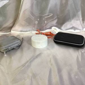 lot 71 image: Etched Pikachu Night Light with Two Protective Cases