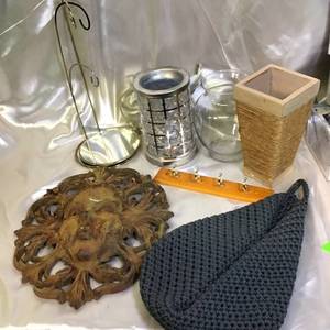 lot 72 image: Assorted Home Decor Collection featuring Cast Iron Wall Plaque and More