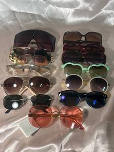lot 85 image: Collection of 12 Stylish Sunglasses Including Heart and Oversized Frames
