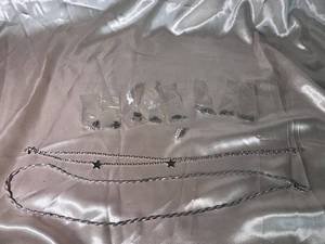 lot 94 image: Set of Silver-Tone Jewelry Chains and Charms
