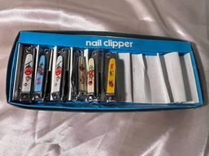 lot 96 image: Set of 6 Decorative Nail Clippers with Floral Designs