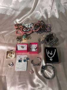 lot 101 image: Collection of Jewelry with Bracelets, Necklaces, and Rings (Sizes 10-11)