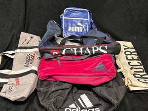 lot 108 image: Collection of Assorted Branded Bags - Puma, Adidas, and More