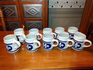 lot 95 image: 10 Colonial White & cobalt blue stoneware mug. Marked Williamsburg