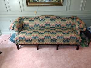 lot 93 image: Custom Upholstered Camelback Sofa Chippendale style with stretcher base frame. L 7 x W 32 x H 32