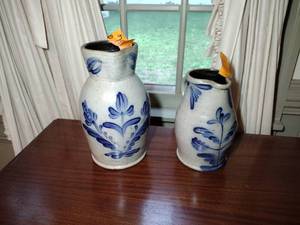 lot 136 image: 2 Rowe Pottery Works Salt Glazed large pitchers 1987 & 1988 11 t & 8  t