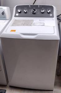 lot 17B image: GE Washer with stainless steel drum. Model GTW485ASW0WB
