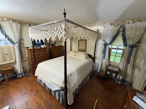 lot 31A image: Queen size 4-poster canopy wood bed. Custom made skirt included.