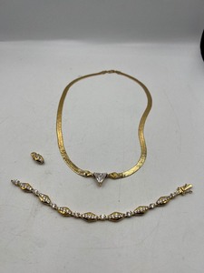 lot 219 image: .925 Silver Italy herringbone necklace with triangle rhinestone , tennis bracelet & one clip earring