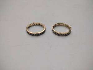lot 229 image: 2 gold bands, not sure what purity the metal is.