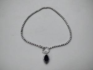 lot 240 image: .925sterling silver necklace with blue center stone and CZ drop pendant
