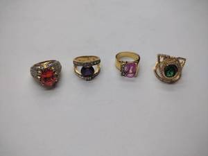 lot 274 image: 4 .925sterling silver rings with colored center stones