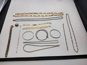lot 246 image: Most items in lot are .925sterling silver. Necklaces, ring, and bracelets.