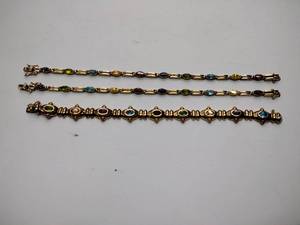 lot 247 image: (3) .925sterling silver bracelets with colored gem stones