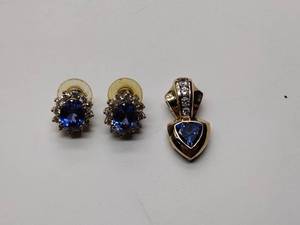 lot 248 image: .925sterling silver pierced earrings and necklace pendant with center blue gem stone