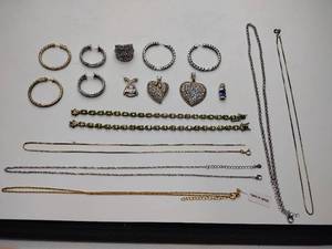 lot 261 image: .925sterling silver pierced earrings, bracelets, necklace chains, and necklace pendants