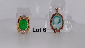 lot 6 image: Two 10K Gold necklace pendants one with diamonds