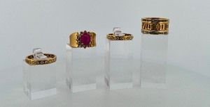 lot 288 image: (4) .925 rings Roman numeral ring size 8.25 pink ring size 7 other two are size 9.25