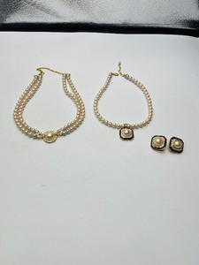 lot 275 image: 2 pearl necklaces and earrings. 17 and 20 1 is marked Bold Elegance