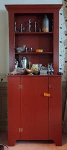lot 252 image: Primitive Red Stepback Cupboard with a single door