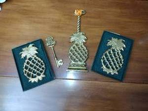 lot 255 image: Williamsburg Virginia MetalCrafters (2) 1999 trivets 2001 door stop Skelton key