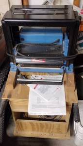 lot 214 image: Ryobi 10 planer Model AP-10 and wooden standRyobi 10 planer Model AP-10 and wooden stand