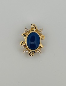 lot 27 image: 14K gold diamond and blue stone pendant 1  l x  w weighs 8 g