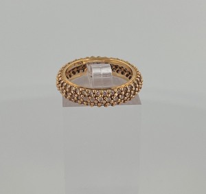 lot 31 image: 10K gold band ring with diamonds  size 6  weight 4g