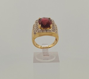 lot 47 image: 14k gold diamond ring with red center stone, 9 grams, size 6 34