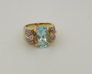 lot 39 image: 14k gold diamond ring with aqua blue and pink gemstones, size 7- 9 gram
