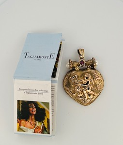 lot 27A image: Italy Tagliamonte 14K Heart shaped Pendant showcasing 2 cupids possibly ruby and pearls, 15g 2 t x 1 w