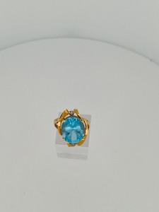 lot 25C image: 14K gold ring with possible diamond & blue topaz. Size 6 