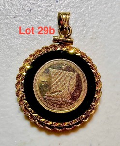 lot 29B image: .9995 Platinum Coin in a 14K Gold pendant