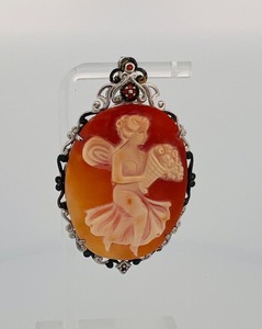 lot 65A image: .925 cameo (possibly pink sapphire) fairy pendant marked NH for Michael Valitutti, 2 t x 1 w,,  21g