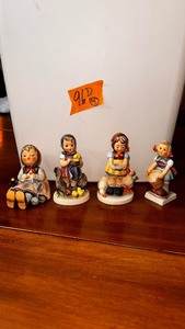lot 96D image: Hummel Figurines Happy Pastimes 69 Feeding Time 199 Be Patient 197 20 Little Helper 73 TMK-3