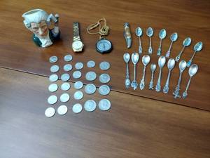 lot 296 image: Collectible coins, spoons, knife, Seiko watch, compass, and Royal Doulton character jug