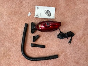 lot 315 image: Fuller brush Co. Mini Maid Vacuum Model FBMV.4QVC
