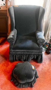 lot 312 image: Upholstered wing-back chair with matching ottomanfootstool. Bring help to move.