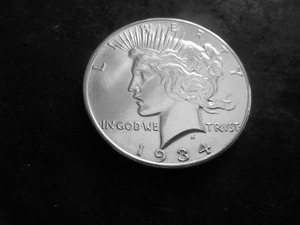 lot 34A image: 1934 D Morgan Silver Dollar