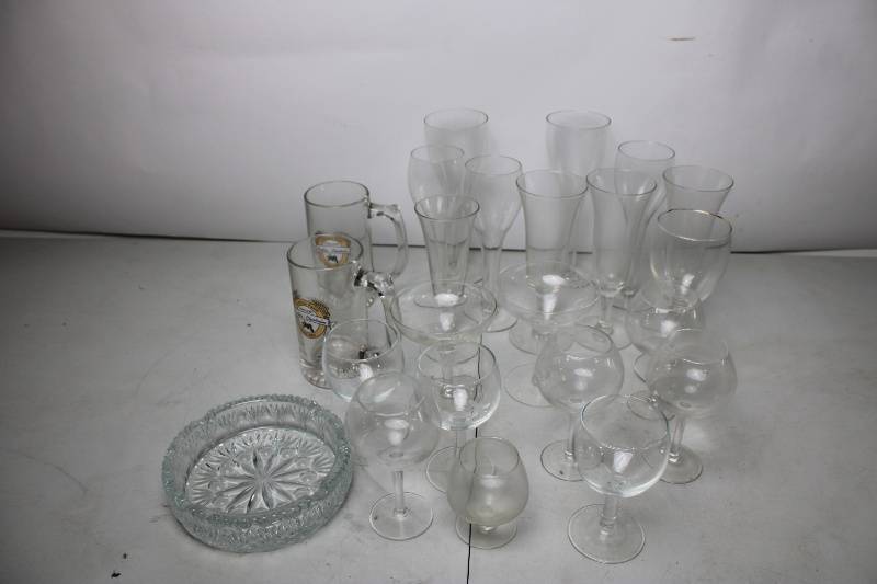 lot 123 image: Collection of Various Glassware Including Beer Mugs, Wine Goblets, and Serving Dish