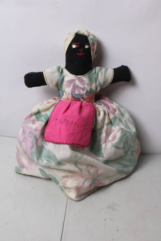 lot 152 image: Handcrafted Jamaican Fabric Doll with Embroidered Apron