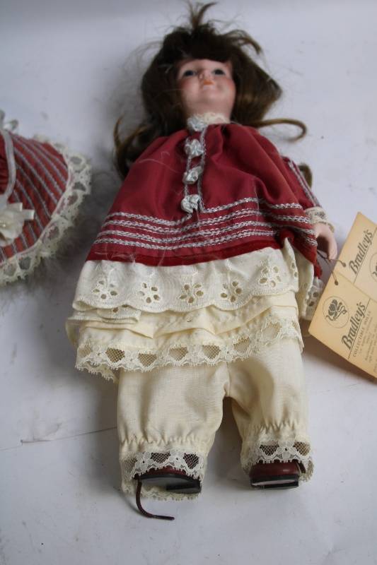 lot 24 image: Bradleys Collectible Doll with Original Hat and Tag