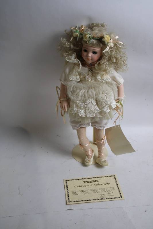 lot 26 image: Seymour Mann Porcelain Collector Doll with Certificate of Authenticity