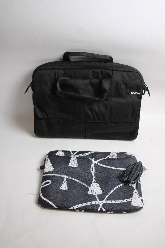 lot 28 image: Incase Laptop Bag and Chicos Designer Pouch Set
