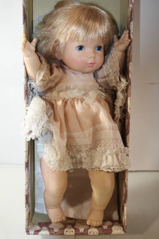 lot 79 image: Vintage Porcelain Baby Doll with Lace Dress