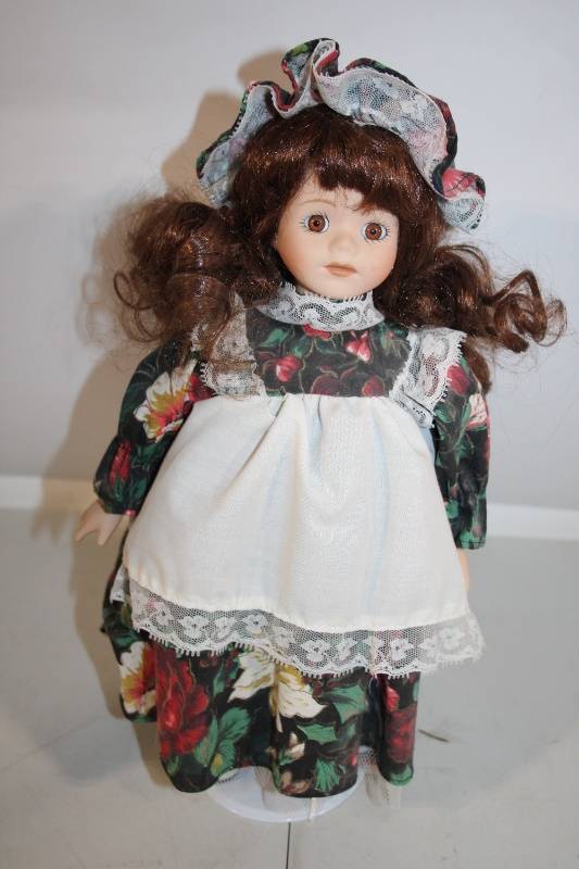 lot 82 image: Vintage Porcelain Victorian Doll in Floral Dress with Bonnet